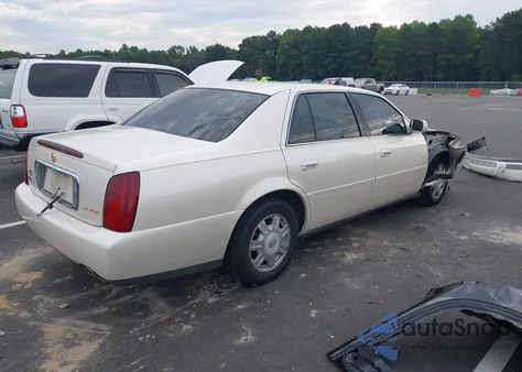 2003 Cadillac Deville Standard из США, поврежденный, VIN 1G6KD54Y43U219781